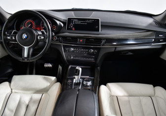 Подержанный автомобиль BMW X5 2015 года (14 фото)