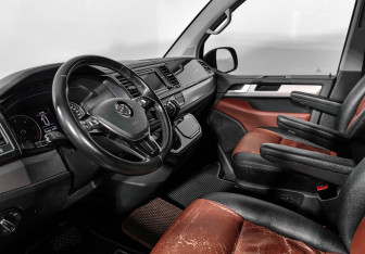 Подержанный автомобиль Volkswagen Multivan 2017 года (9 фото)