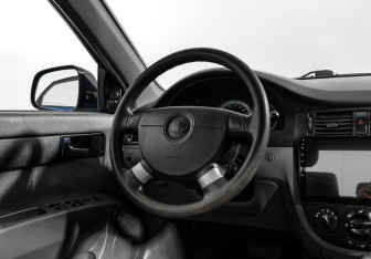Подержанный автомобиль Daewoo Gentra Sedan 2014 года (15 фото)