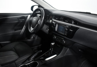Подержанный автомобиль Toyota Corolla Sedan 2014 года (13 фото)