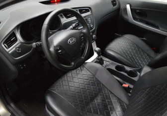 Подержанный автомобиль Kia Ceed Hatchback 2015 года (10 фото)