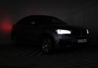 Подержанный автомобиль BMW X6 2017 года (31 фото)