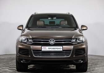 Подержанный автомобиль Volkswagen Touareg 2014 года (2 фото)