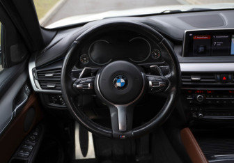 Подержанный автомобиль BMW X6 2018 года (9 фото)