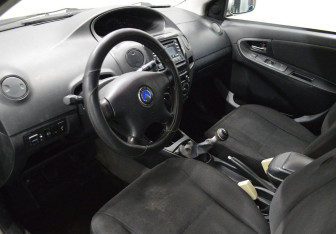 Подержанный автомобиль Geely MK 2010 года (10 фото)