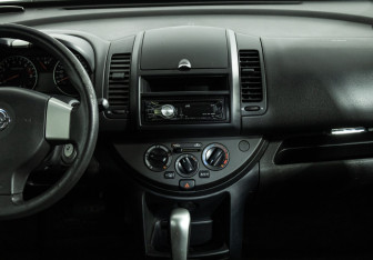 Подержанный автомобиль Nissan Note 2012 года (14 фото)