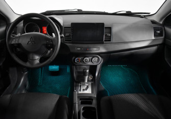 Подержанный автомобиль Mitsubishi Lancer Hatchback 2010 года (14 фото)