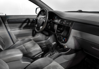 Подержанный автомобиль Daewoo Gentra Sedan 2014 года (13 фото)