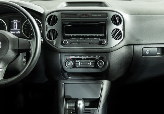 Подержанный автомобиль Volkswagen Tiguan 2014 года (14 фото)