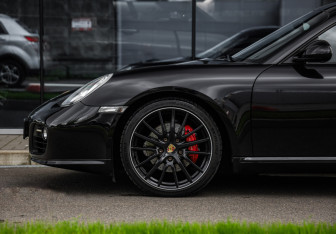 Подержанный автомобиль Porsche Cayman 2010 года (10 фото)