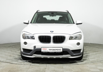 Подержанный автомобиль BMW X1 2014 года (2 фото)