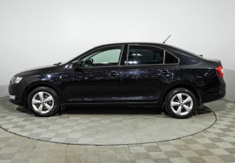 Подержанный автомобиль Skoda Rapid Liftback 2014 года (8 фото)