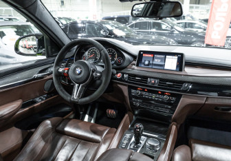 Подержанный автомобиль BMW X6 M 2015 года (15 фото)