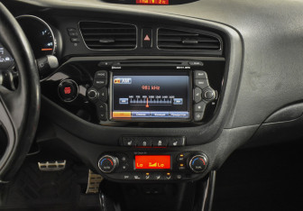 Подержанный автомобиль Kia Ceed Wagon 2014 года (15 фото)