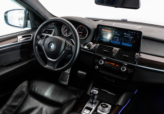Подержанный автомобиль BMW X6 2013 года (16 фото)