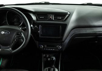 Подержанный автомобиль Kia Rio Sedan 2016 года (14 фото)