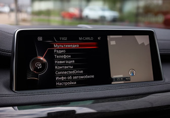 Подержанный автомобиль BMW X6 2016 года (21 фото)