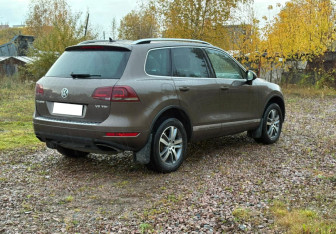 Подержанный автомобиль Volkswagen Touareg 2014 года (4 фото)