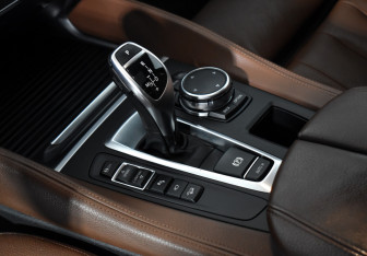 Подержанный автомобиль BMW X6 2016 года (14 фото)