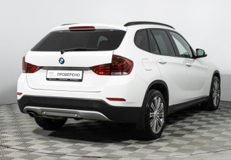 Подержанный автомобиль BMW X1 2013 года (5 фото)