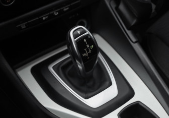 Подержанный автомобиль BMW X1 2013 года (18 фото)