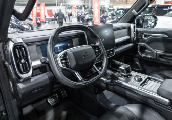 Подержанный автомобиль Jetour T2 2024 года (12 фото)