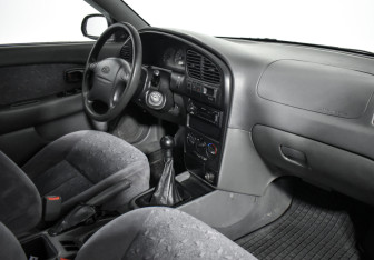 Подержанный автомобиль Kia Spectra Sedan 2007 года (12 фото)