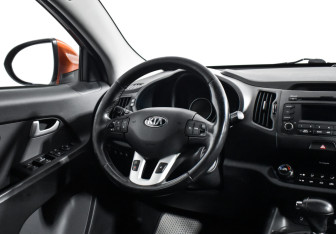 Подержанный автомобиль Kia Sportage 2013 года (15 фото)