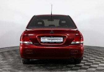 Подержанный автомобиль Mitsubishi Lancer Sedan 2005 года (6 фото)