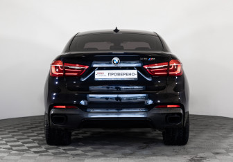 Подержанный автомобиль BMW X6 2015 года (7 фото)
