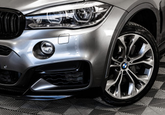 Подержанный автомобиль BMW X6 2018 года (2 фото)