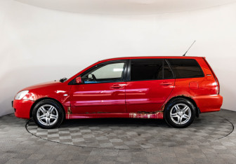 Подержанный автомобиль Mitsubishi Lancer Wagon 2004 года (8 фото)