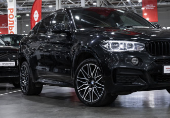 Подержанный автомобиль BMW X6 2018 года (6 фото)