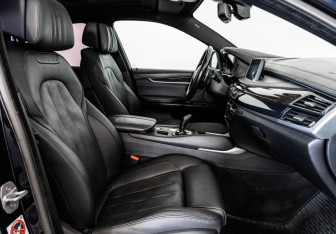 Подержанный автомобиль BMW X6 2015 года (27 фото)