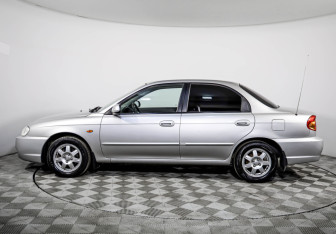 Подержанный автомобиль Kia Spectra Sedan 2009 года (8 фото)