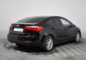 Подержанный автомобиль Kia Cerato Sedan 2014 года (5 фото)