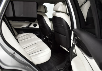 Подержанный автомобиль BMW X5 2015 года (12 фото)