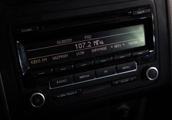 Подержанный автомобиль Volkswagen Touran 2012 года (14 фото)