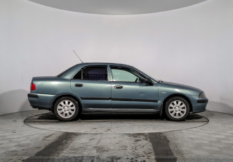 Подержанный автомобиль Mitsubishi Carisma Sedan 2003 года (4 фото)