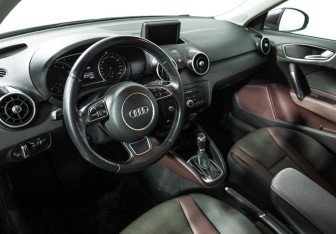 Подержанный автомобиль Audi A1 2014 года (11 фото)