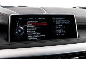 Подержанный автомобиль BMW X6 2015 года (17 фото)