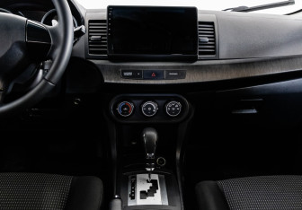 Подержанный автомобиль Mitsubishi Lancer Sedan 2008 года (13 фото)