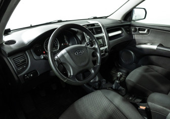 Подержанный автомобиль Kia Sportage 2010 года (11 фото)