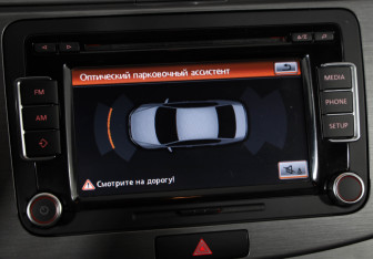 Подержанный автомобиль Volkswagen Passat Sedan 2012 года (14 фото)