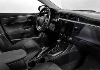 Подержанный автомобиль Toyota Corolla Sedan 2014 года (13 фото)