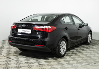 Подержанный автомобиль Kia Cerato Sedan 2013 года (5 фото)
