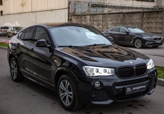 Подержанный автомобиль BMW X4 2015 года (4 фото)