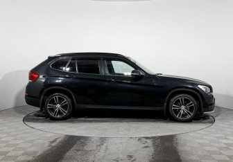 Подержанный автомобиль BMW X1 2014 года (4 фото)