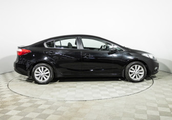 Подержанный автомобиль Kia Cerato Sedan 2013 года (4 фото)