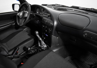 Подержанный автомобиль Chevrolet Niva 2011 года (12 фото)